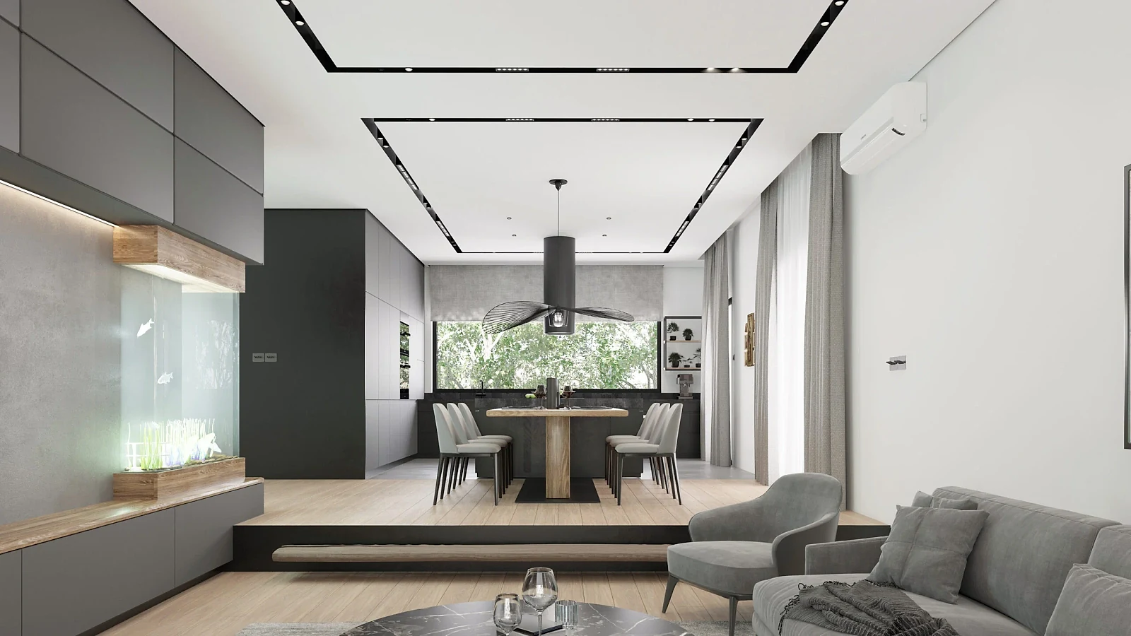 Split-level Kovačevac House living area with an integrated aquarium and open kitchen beyond