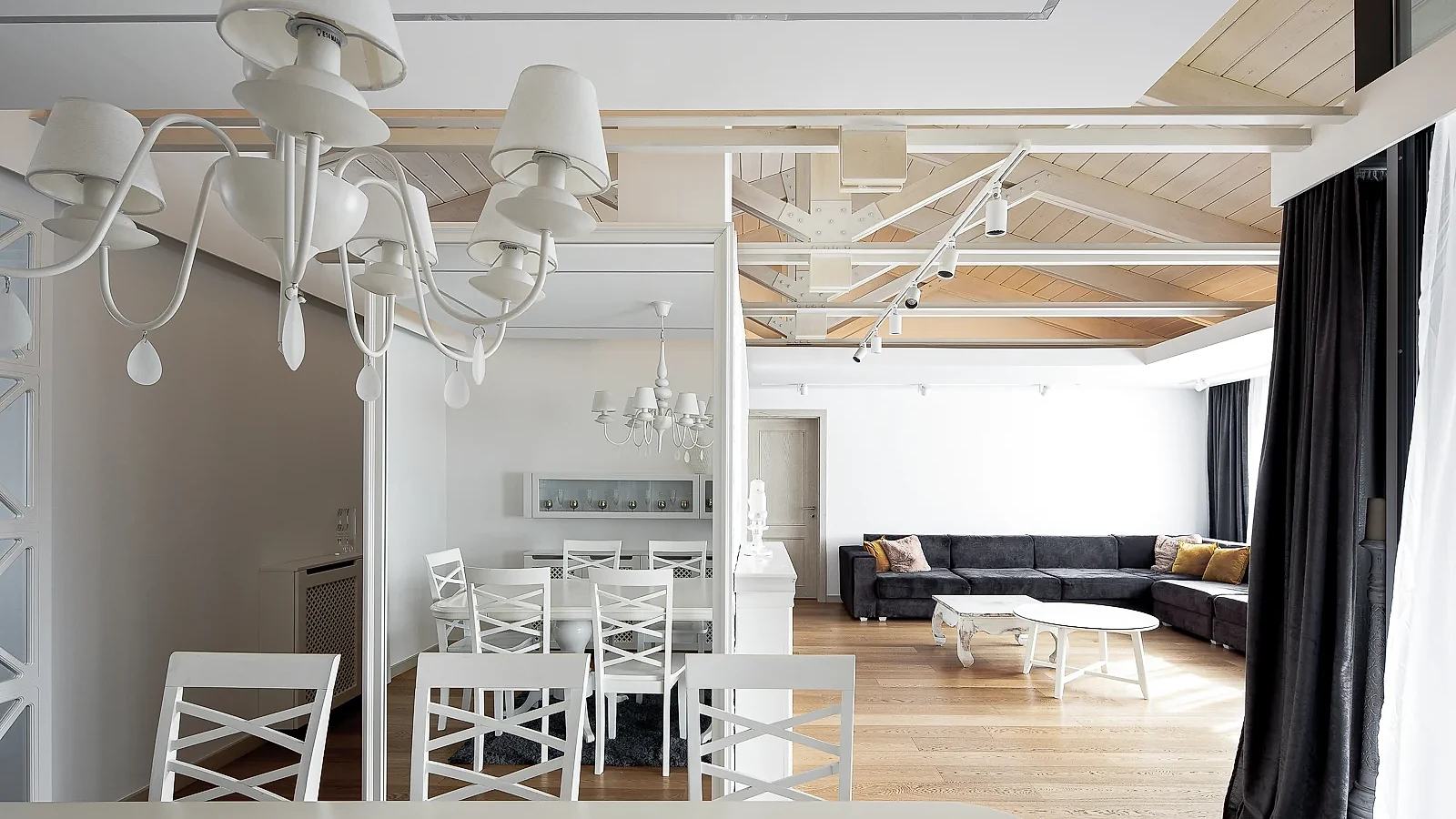 Layered floating ceiling planes connecting the S27 dining and living areas