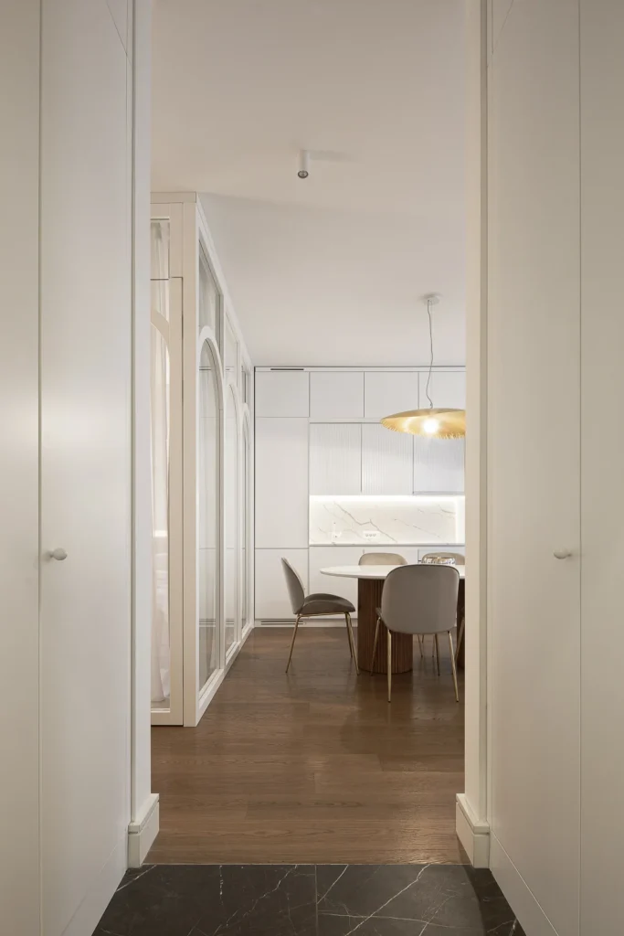 KMR Apartment corridor connecting the relocated kitchen with the living area