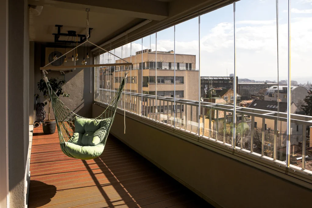 Enclosed A75 Apartment terrace with timber flooring and panoramic views over Belgrade