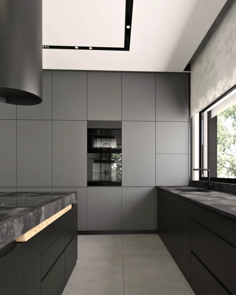 Dark custom kitchen cabinetry and stone worktops in Kovačevac House
