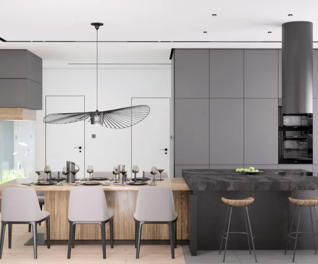 Kovačevac House open kitchen and dining area centred on a sculptural island hood