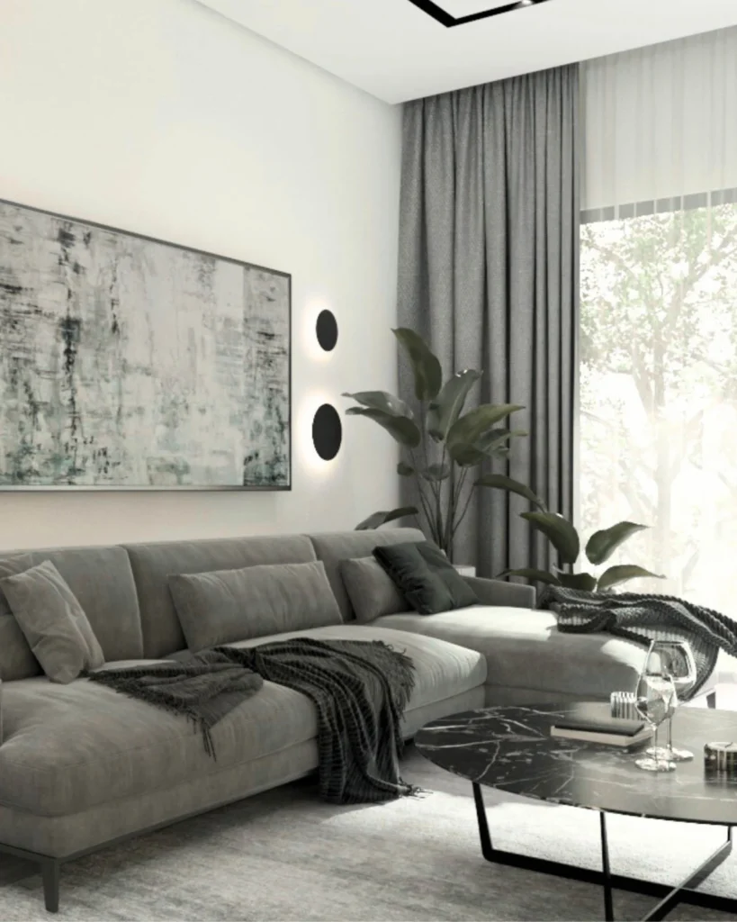 Kovačevac House lounge with grey modular seating, artwork and floor-to-ceiling curtains