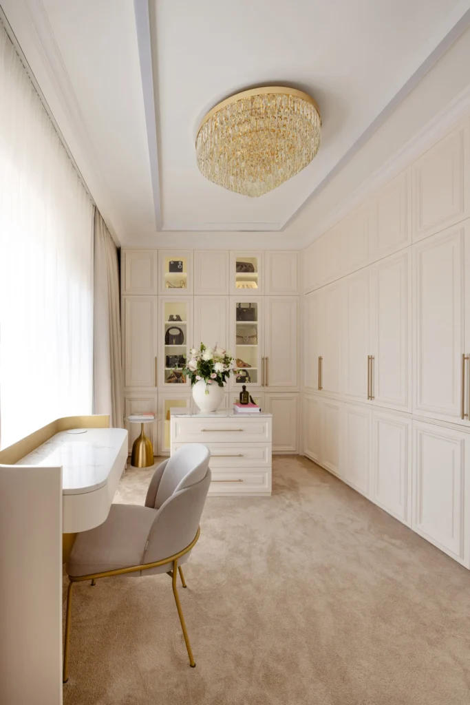 MBS Master Suite dressing room with curved vanity, full-height mirror and bespoke cabinetry