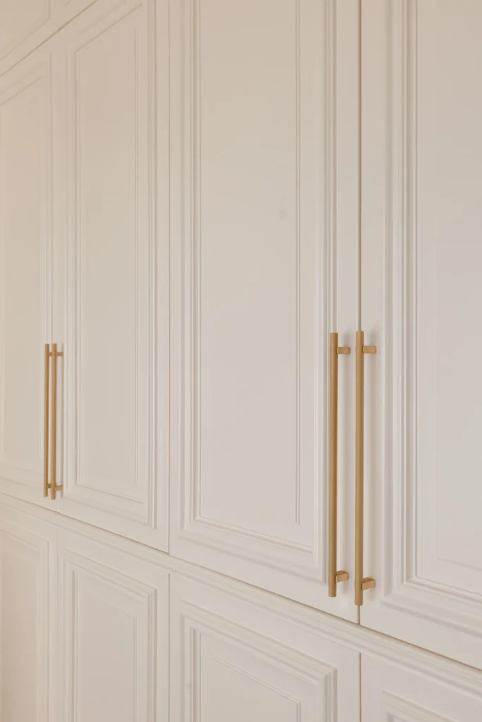 MBS Master Suite panelled wardrobe doors with long brushed brass handles