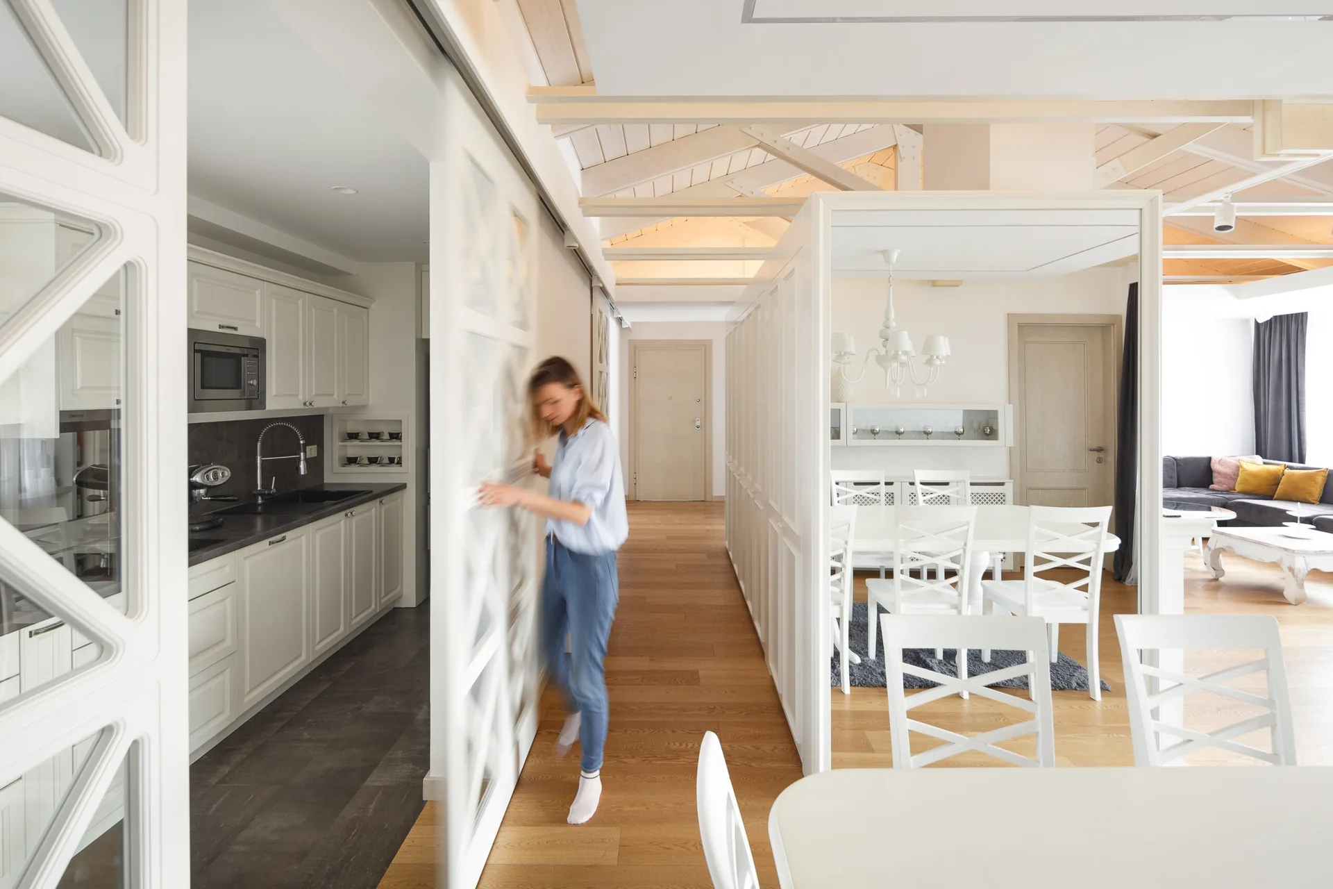 S27 Apartment open dining area beneath the exposed attic roof structure